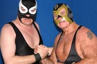 AWA Coastal champion The Nighthawk and WWE Hall of Fame member Bullet Bob Armstrong have a reunion at an AWA card in Florida in 2006.